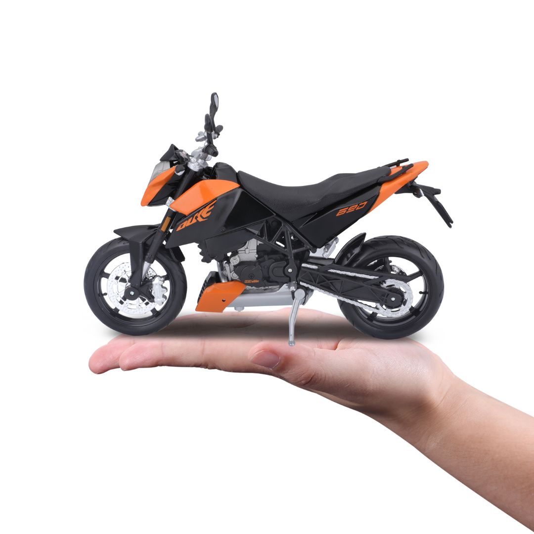31101 20-09265 Bburago Maisto - KTM 690 Duke, arancione e nero - Scala 1:12