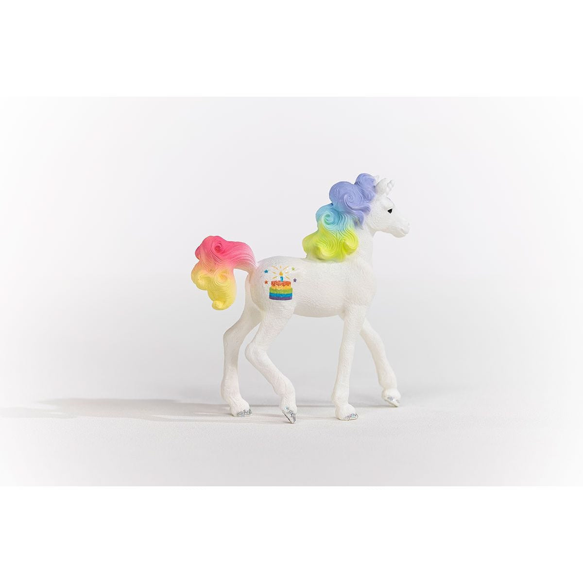 70742 Schleich Bayala - Rainbow Cake, unicorno da collezione