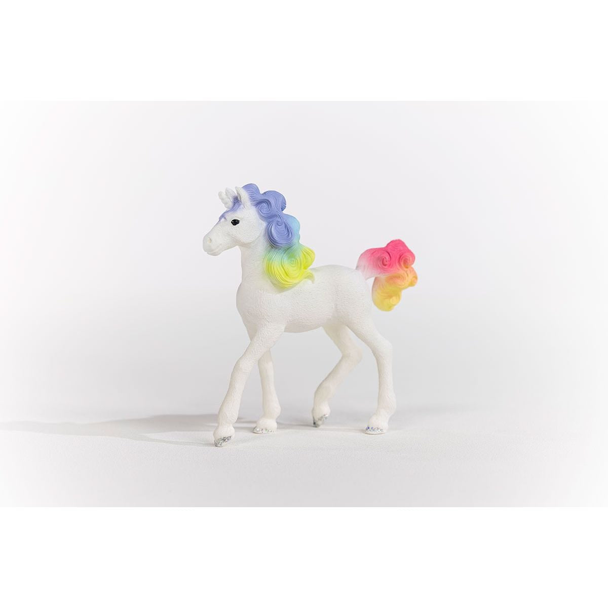 70742 Schleich Bayala - Rainbow Cake, unicorno da collezione